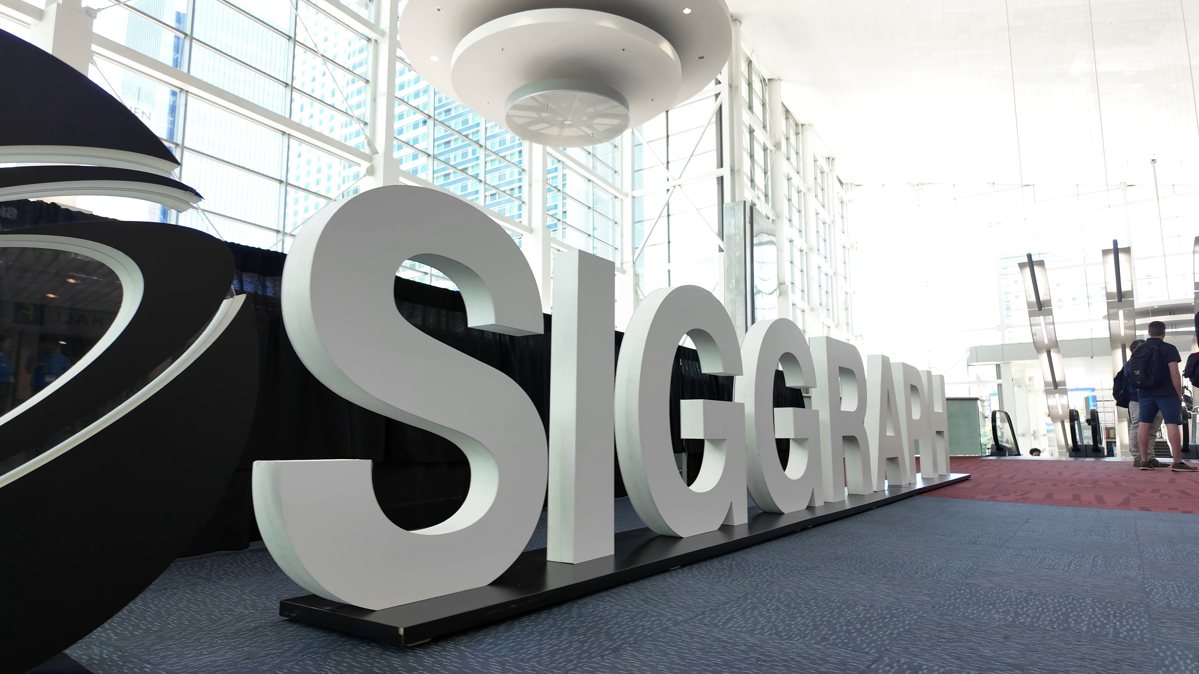 Large SIGGRAPH lettering inside the Los Angeles Convention Center.